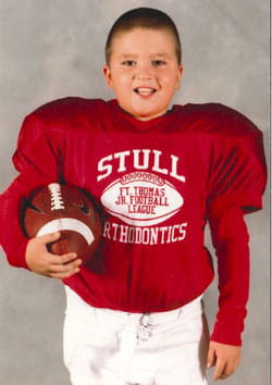 Kenneth in his youth football uniform.